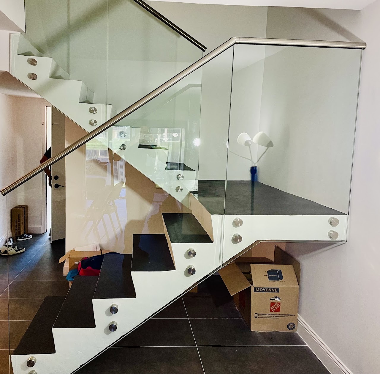 Modern glass stair railing in a Contis Glass project