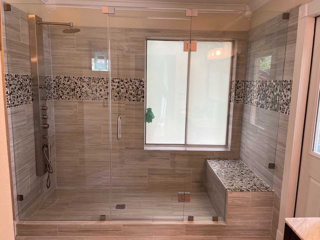 Wide shower enclosure with window